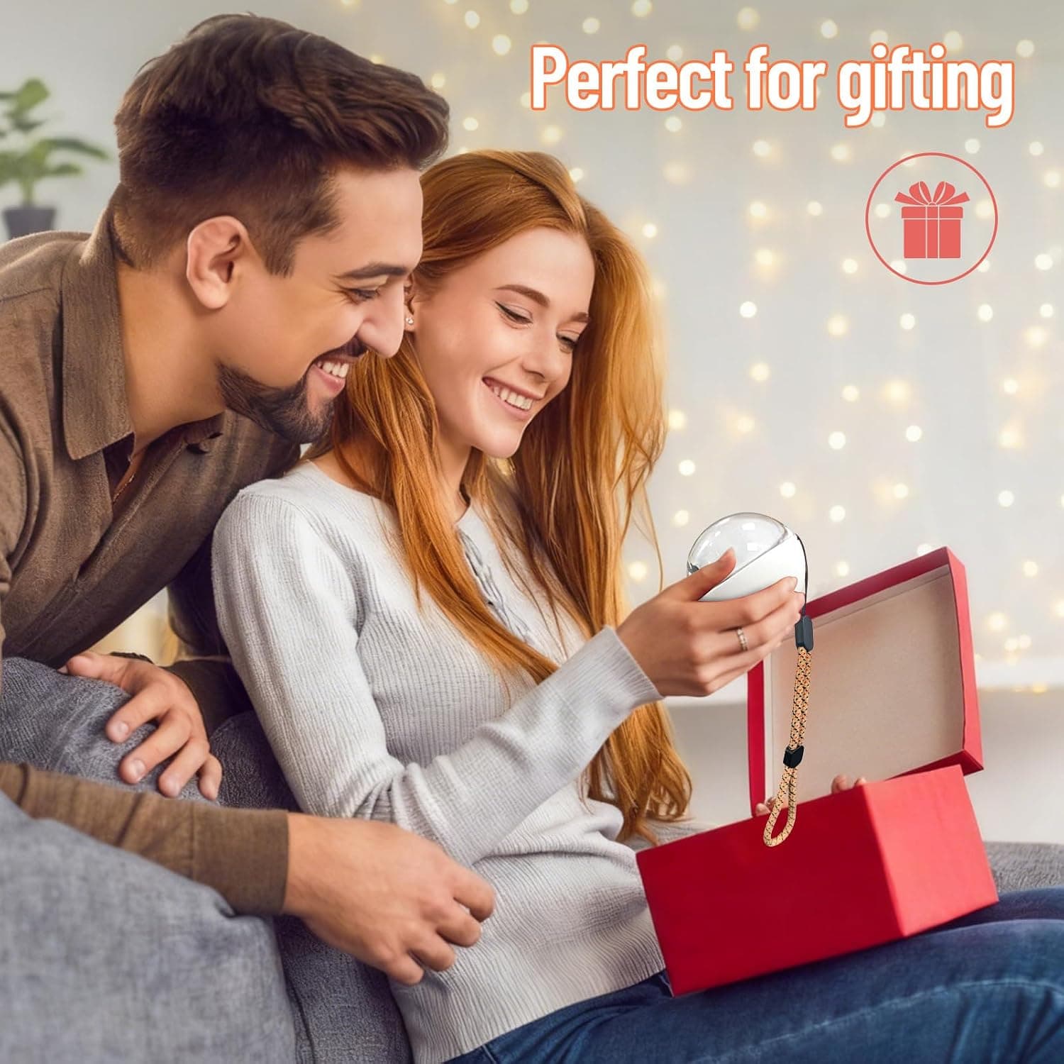 A couple unboxing a Illumina Orb gift